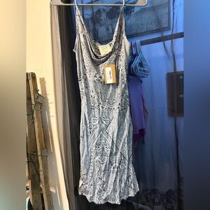 Women’s mini dress. Has adjustable straps